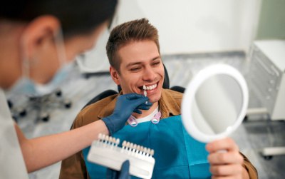 Dentist in Grapevine talking to patient about cosmetic dentistry